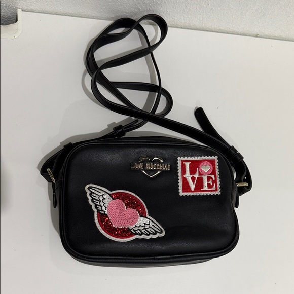 Love Moschino Handbags - Love Moschino Black Crossbody Bag w/ Extra Red Strap & Heart Patches